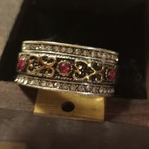 Intricate Gold and Silver Ring with Red Highlights
